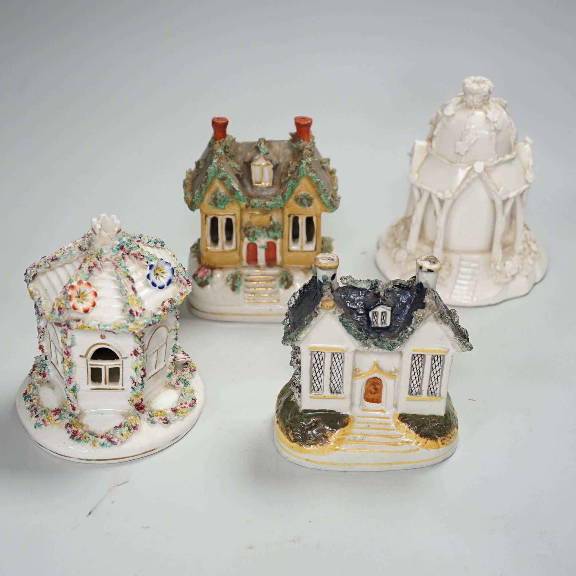 Thirteen Staffordshire 'cottage’ pastille burners or models